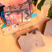 Bar of soap with 'Aloha, Beaches!' packaging on a beach-themed background